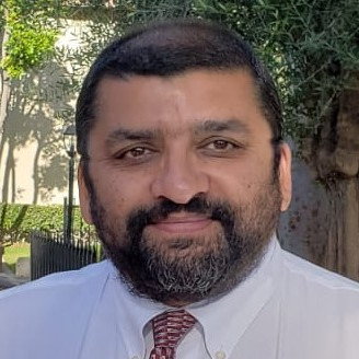 Portrait of Abhinav A. Mehta, leadership coach and founder of Bliss Solutions Inc.